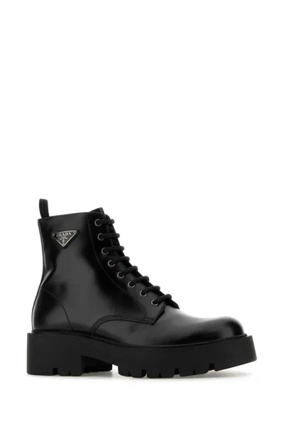 Prada Logo-plaque Panelled Ankle Boots In Black
