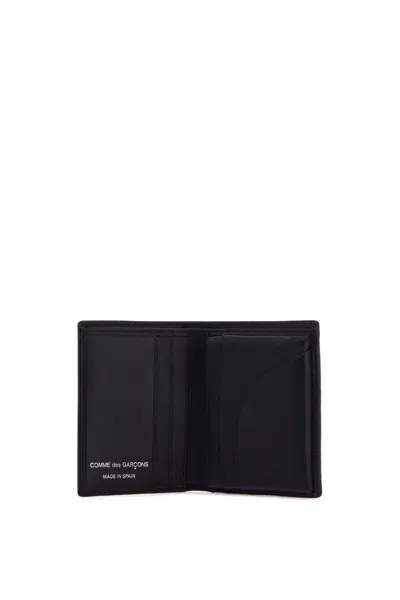 Shop Comme Des Garçons Compact Leather Wallet With Large Eyelet. In Black