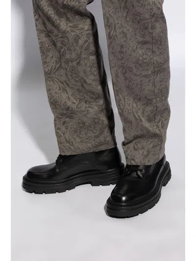 Versace Chunky Sole Ankle-high Boots With Round Toe In Black