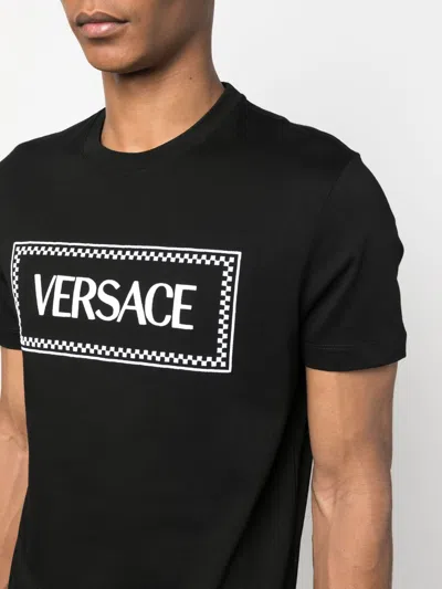 Versace Black Crewneck T-shirt With Contrasting Logo Lettering Print In Cotton