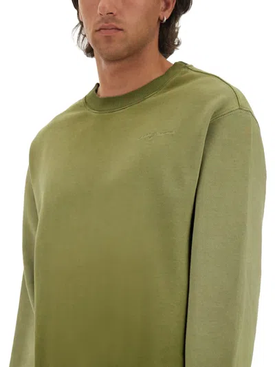 Msgm Washed Out Jersey Sweatshirt In Green