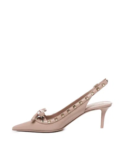 Shop Valentino Rockstud Bow Pumps In Rose Cannelle