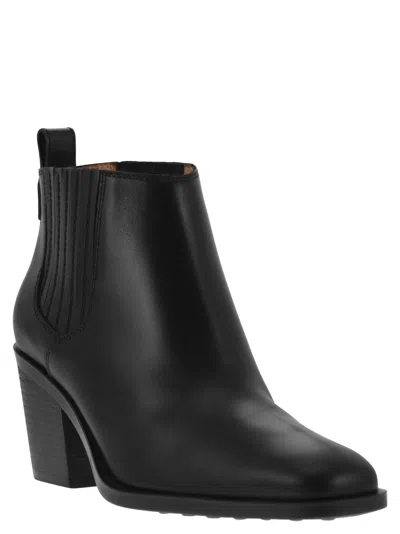 Shop Tod's Leather Boot In Black