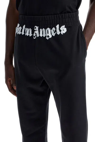 Shop Palm Angels Logo Print Joggers With Seven In Black Off White (black)