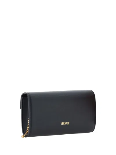 Shop Versace Shoulder Bag In Black- Gold