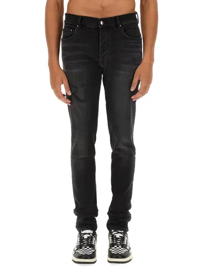 Shop Amiri Slim Fit Jeans In Black