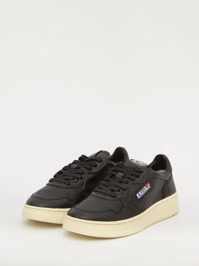 Shop Autry Black Medalist Sneakers