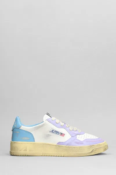 Autry Super Vintage Distressed Leather Sneakers In White