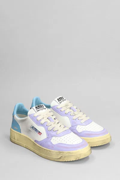 Autry Super Vintage Distressed Leather Sneakers In White