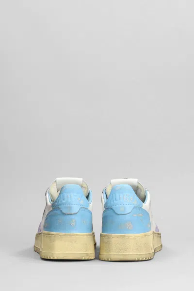 Autry Super Vintage Distressed Leather Sneakers In White