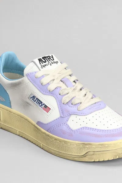 Autry Super Vintage Distressed Leather Sneakers In White