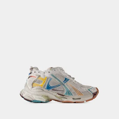 Shop Balenciaga Runner Sneakers In White