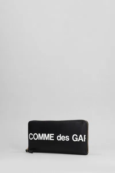 Comme Des Garçons Leather Pouch With Logo Print In Black