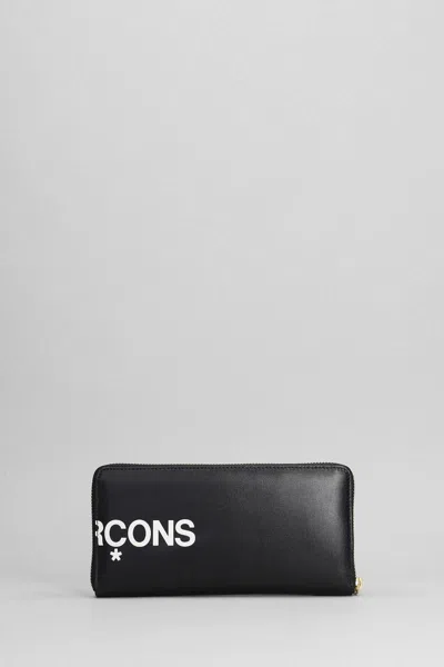 Comme Des Garçons Leather Pouch With Logo Print In Black