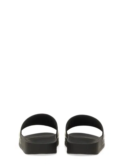 Shop Moschino Slide Sandal With Logo In Black