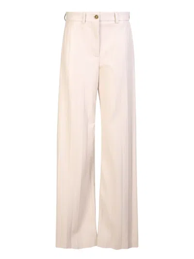 Shop Msgm Pants In Beige