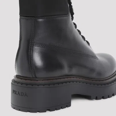 Prada Polished Leather Boots With Sole And Lace-up Design In Black