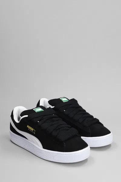 Puma Stamped-logo Suede Platform Sneakers In Black