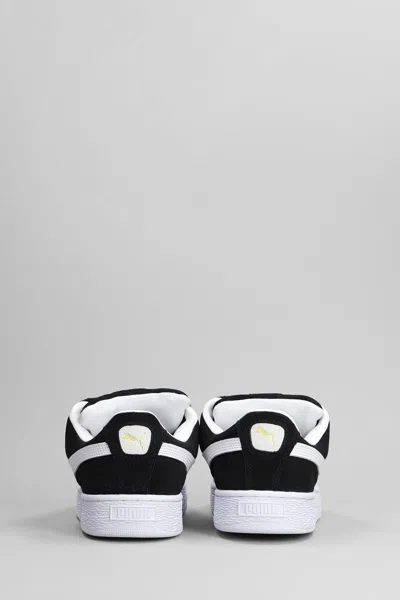 Puma Stamped-logo Suede Platform Sneakers In Black