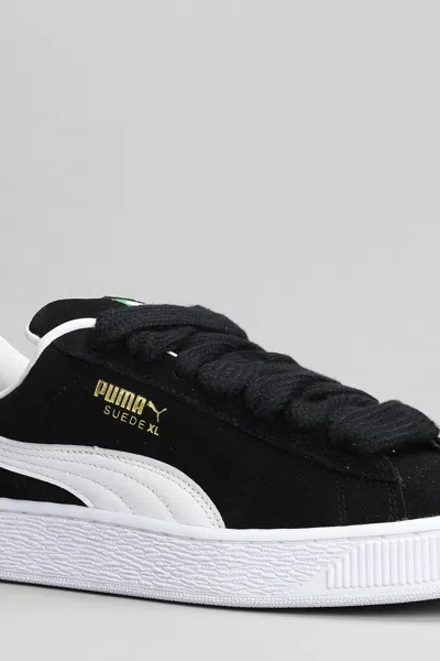 Puma Stamped-logo Suede Platform Sneakers In Black
