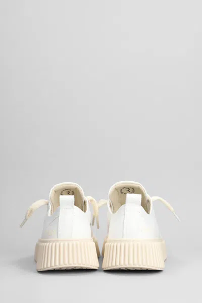 Shop Rhun Sneakers In White