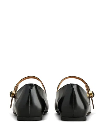 Shop Tod's Flat Shoes Black