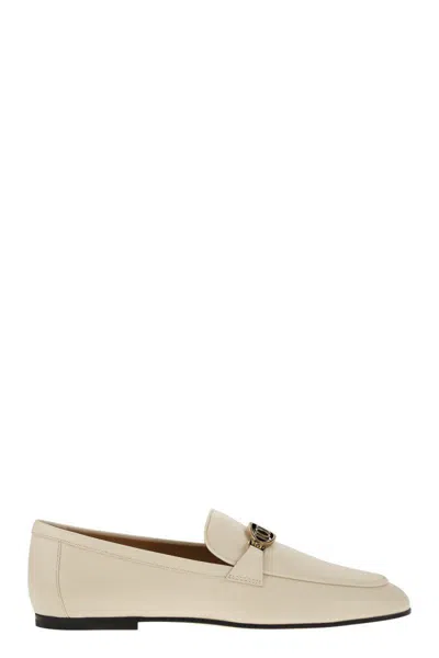 Tod's Logo-plaque Leather Loafers In Beige