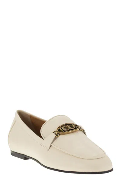 Tod's Logo-plaque Leather Loafers In Beige