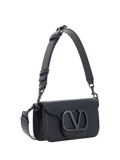 Shop Valentino Garavani Handbags. In Black