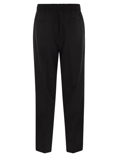 Brunello Cucinelli Men Leisure Fit Trousers In Garment-dyed Linen Gabardine With Drawstring And Doub