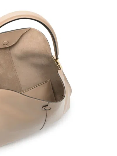 Shop Tod's Hobo T Case Bag