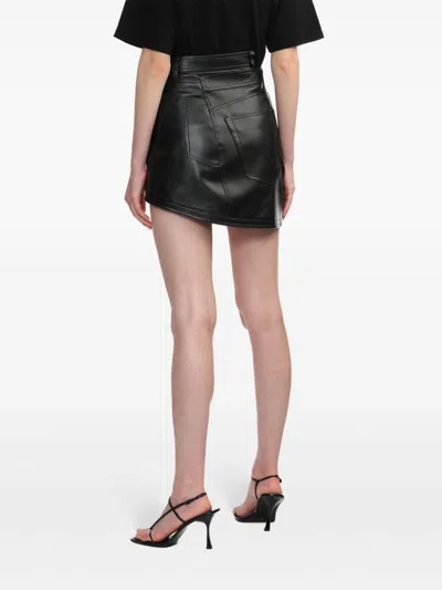 Shop Kimhēkim Logo-appliqué Asymmetric Mini Skirt In Black