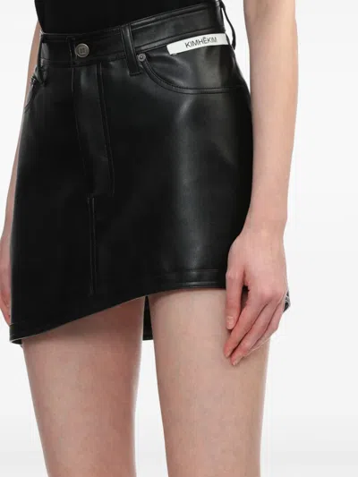 Shop Kimhēkim Logo-appliqué Asymmetric Mini Skirt In Black