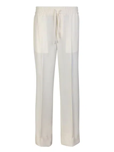 Shop Brioni Trousers In White