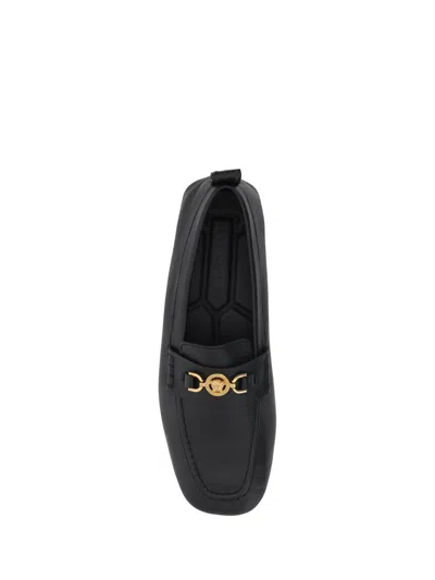 Shop Versace Sandals In Black