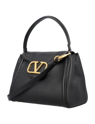 Shop Valentino Garavani Top Handle Bag In Black