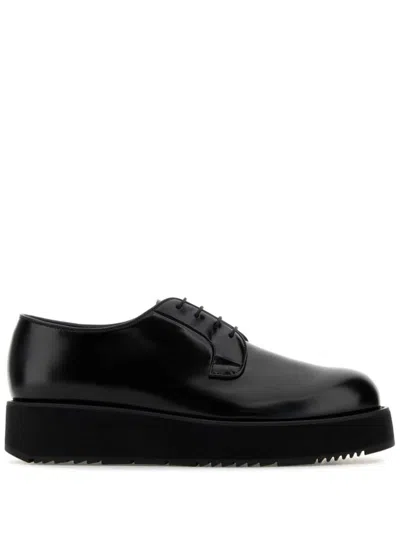 Shop Prada Brushed-leather Derby Shoes In Black