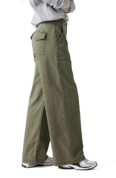 Shop Levi's Surplus Straight Leg Pants In Olive Night Pigment