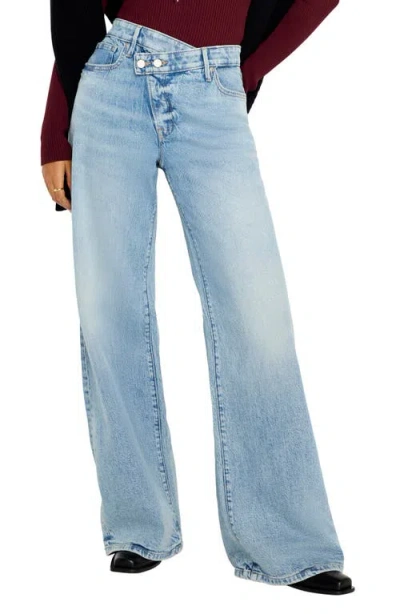 Shop Good American Good Ease Crossover Waist Wide Leg Jeans In Indigo712