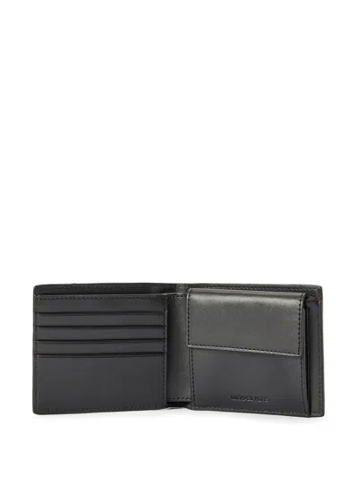 Shop Michael Kors Hudson Leather Wallet In Black