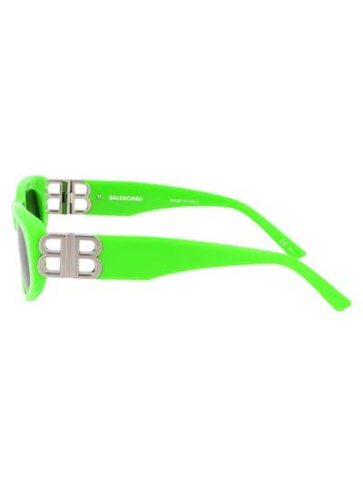 Shop Balenciaga Sunglasses In 009 Green Silver Grey