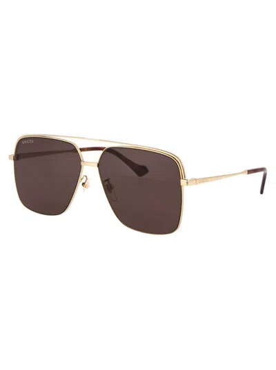 Shop Gucci Eyewear Sunglasses In Gold