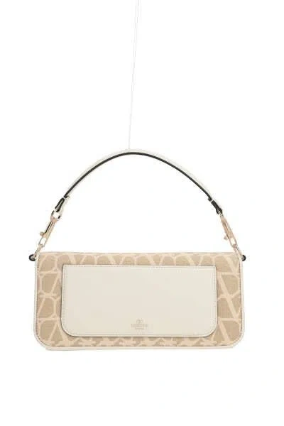 Shop Valentino Garavani Handbags. In Printed