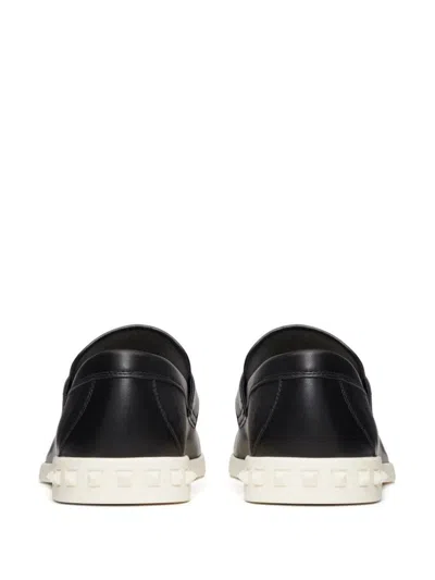 Shop Valentino Garavani Leisure Flows Leather Slip On In Black