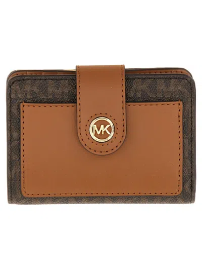 Shop Michael Kors Wallet With Logo In Brown