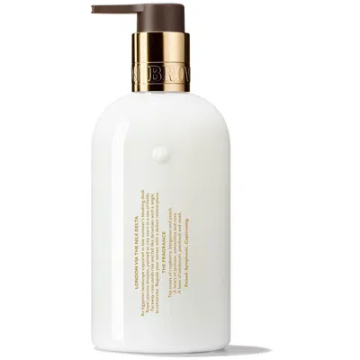 Shop Molton Brown Jasmine & Sun Rose Body Lotion 300ml