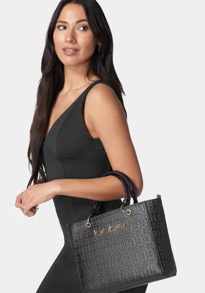 Bebe Celia Embossed Logo Satchel In Black