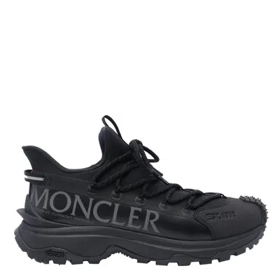 Shop Moncler Sneakers In Black