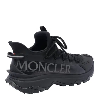 Shop Moncler Sneakers In Black