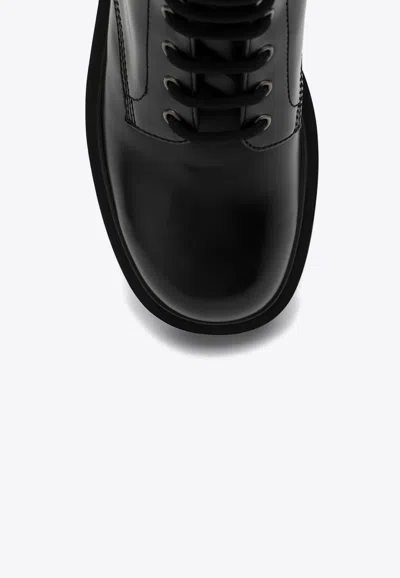 Prada Brushed Leather Ankle Boot For Men In Black